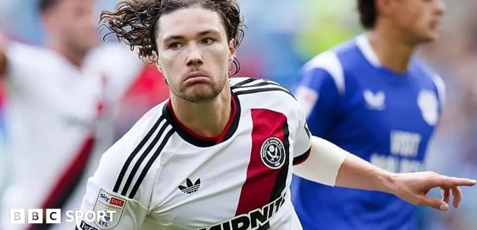 Sheffield United player celebrating after scoring goal