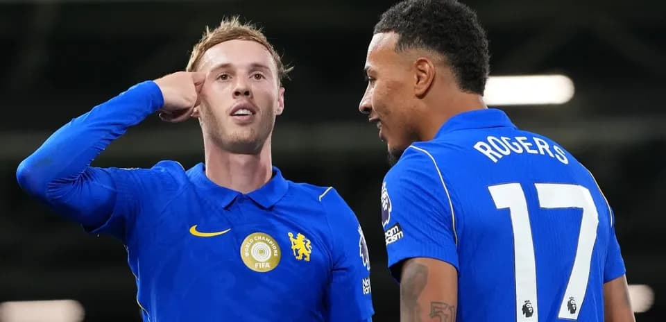 Two players celebrating during a match moment
