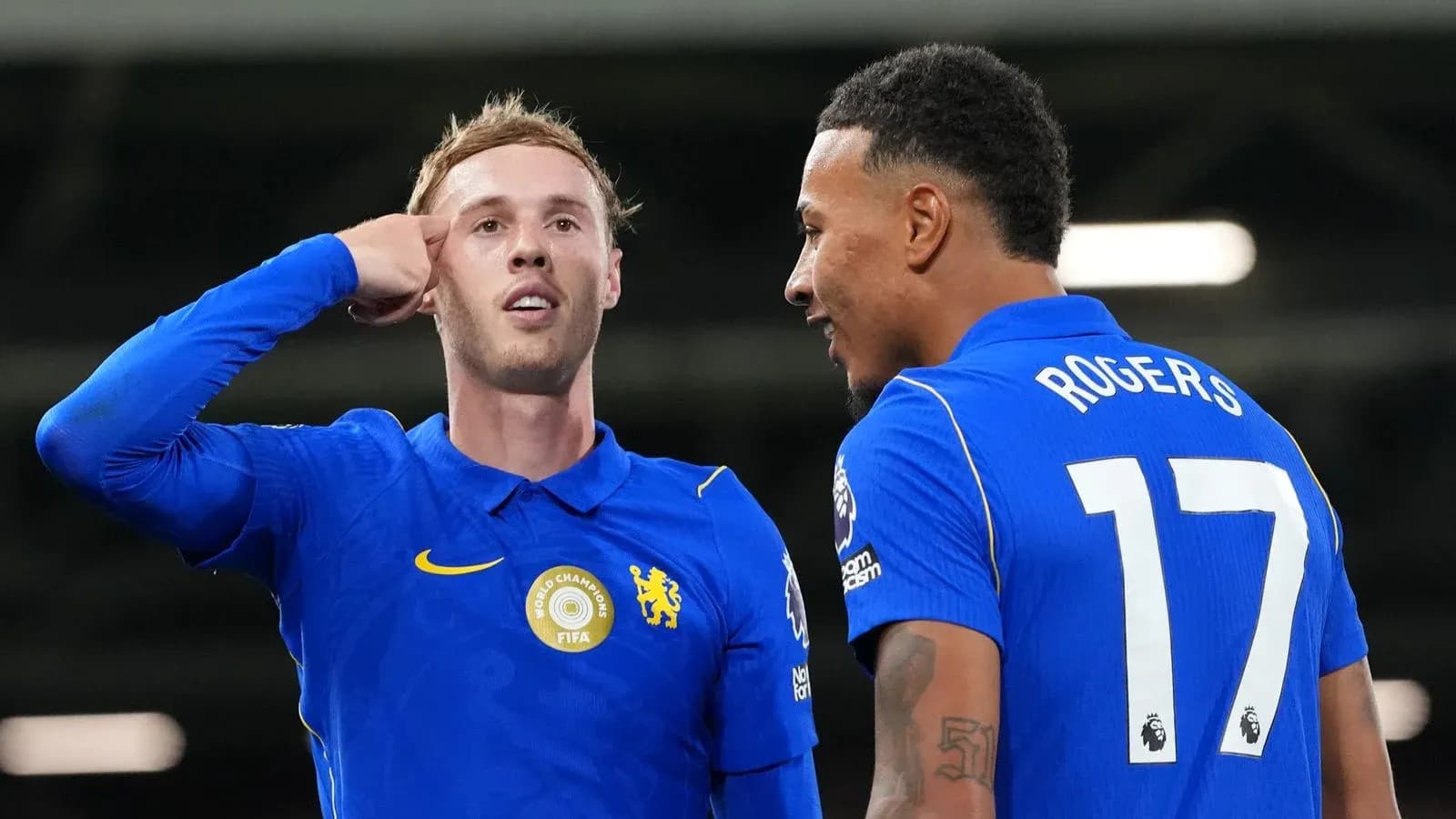 Two players celebrating during a match moment
