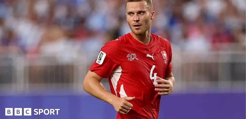 Swiss player running on the field during match