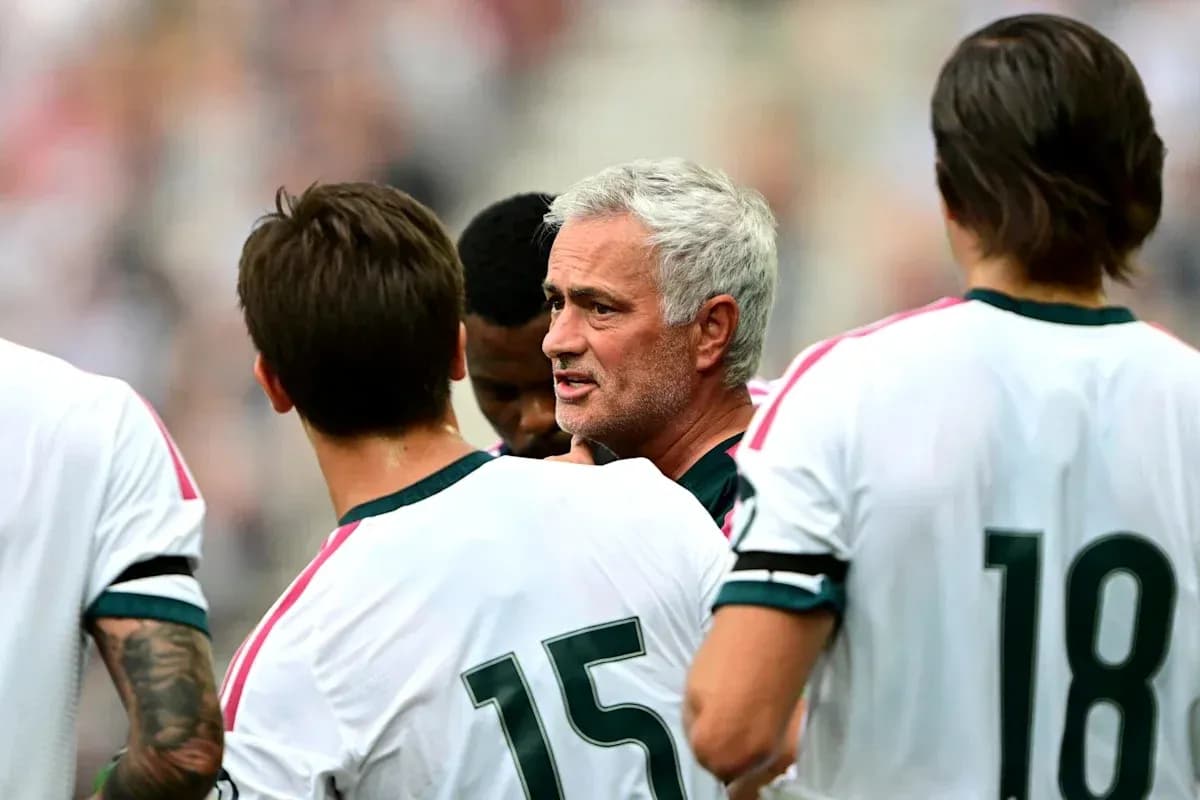 Coach discussing strategy with players during match