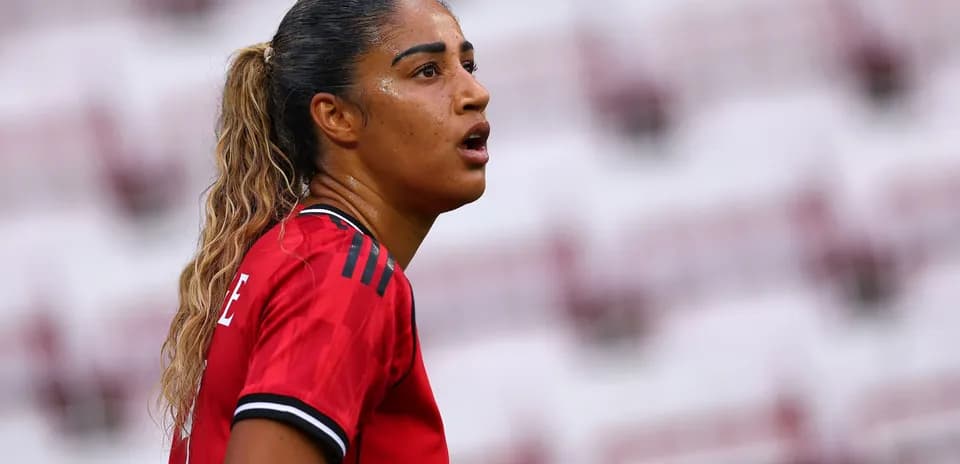 Player wearing red jersey during a match