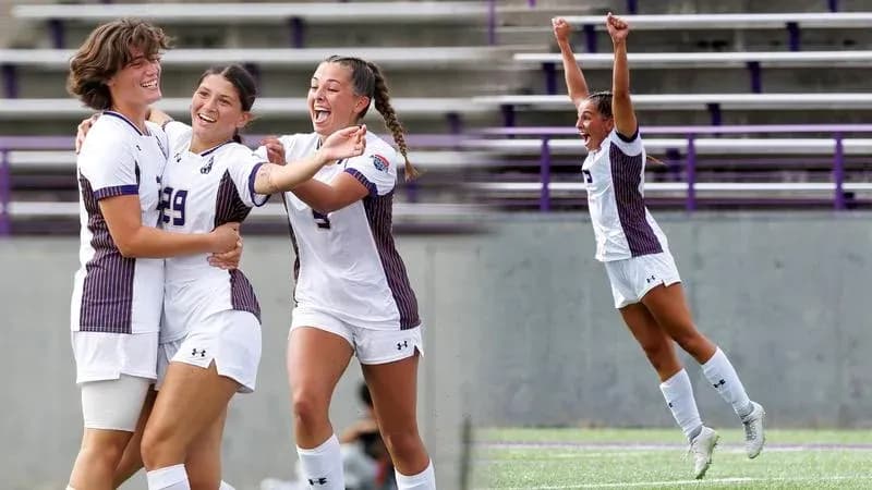 Soccer players celebrating a goal on the field