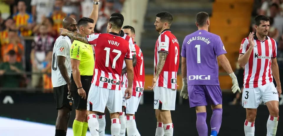 Players reacting to a red card during match