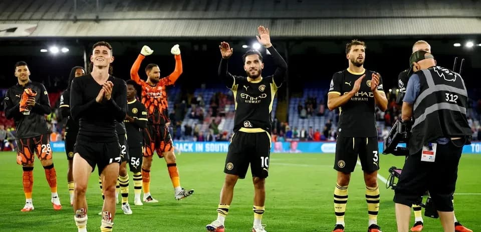 Players applauding fans after the match