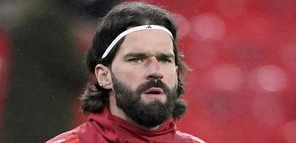 Player with long hair and beard in training gear
