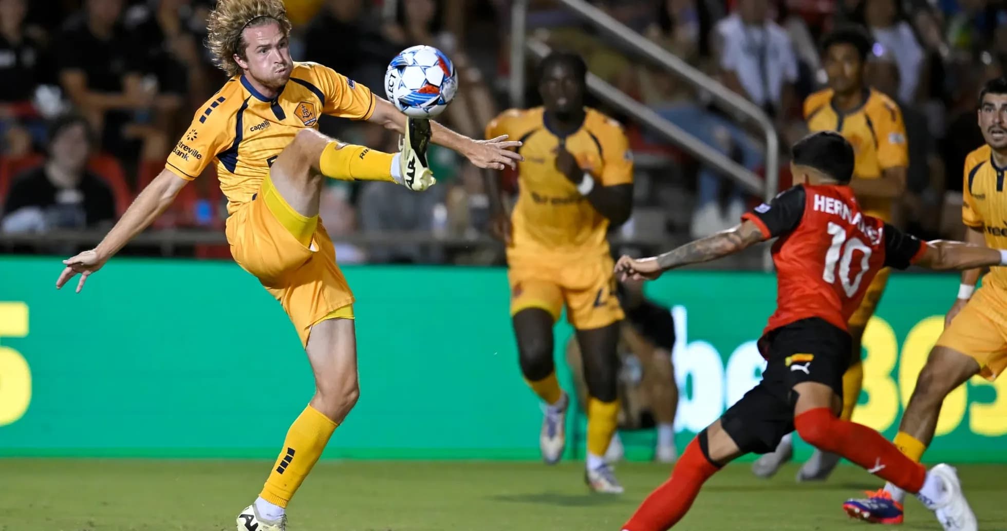 Player kicking ball during Indy Eleven match