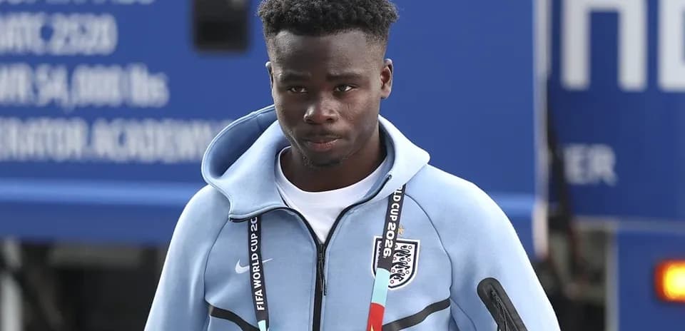 Player arriving at venue wearing training attire