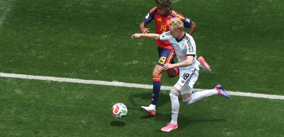 Players contesting for the ball during a match