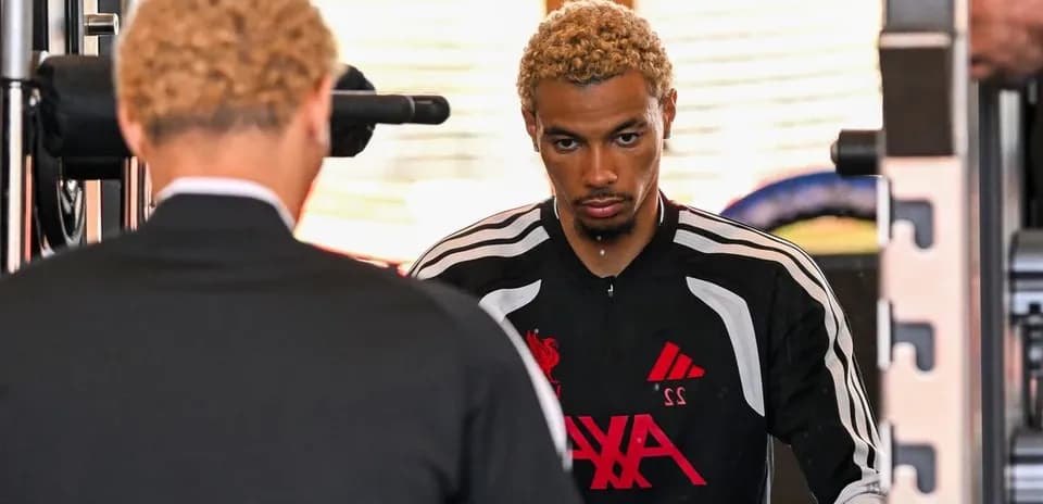 Player training in gym with focused expression