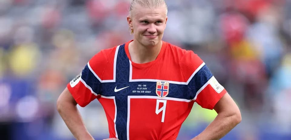 Norwegian player wearing national team jersey on field