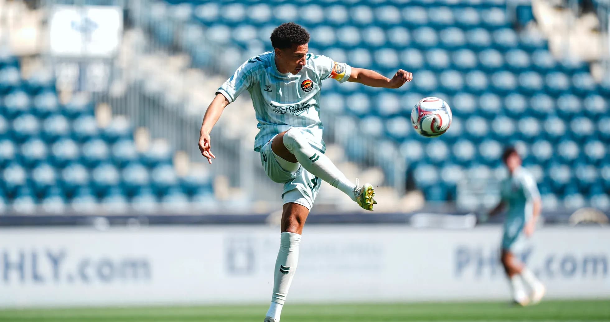 Player kicking ball during Philadelphia Union II match