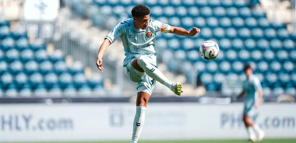 Player kicking ball during Philadelphia Union II match