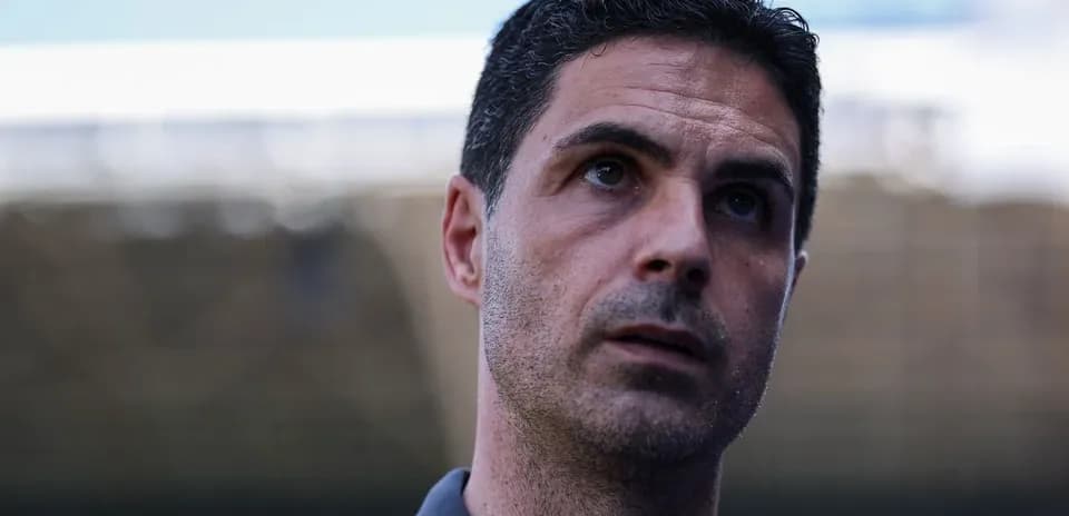 Football manager speaking during a press conference