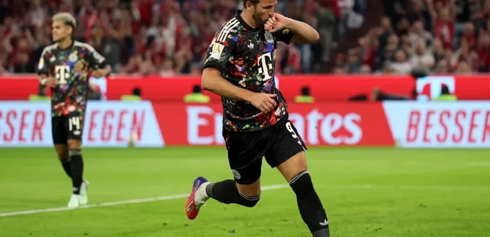 Player celebrating a goal on the pitch