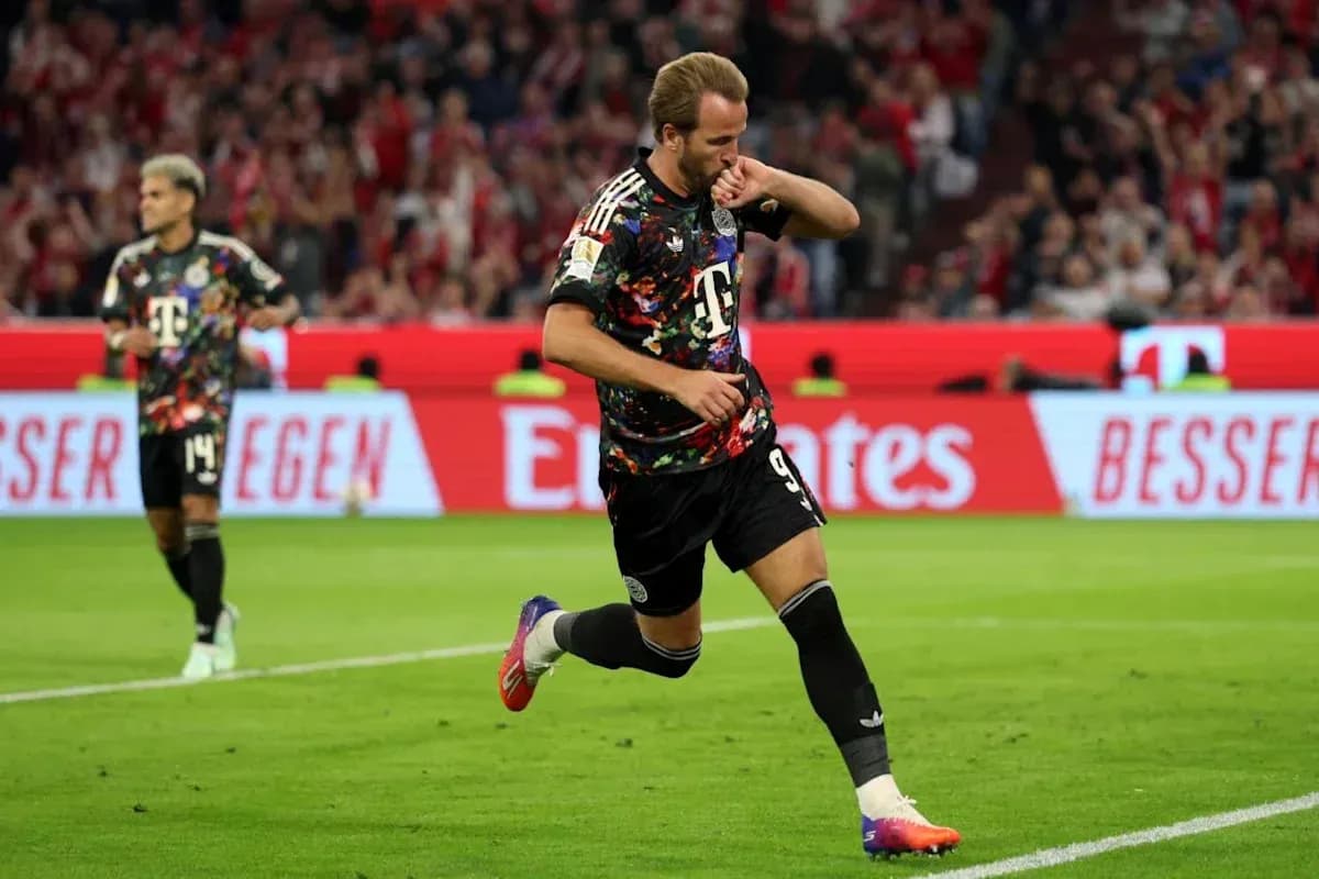 Player celebrating a goal on the pitch