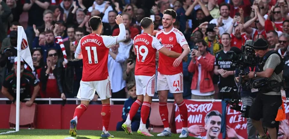 Arsenal players celebrating a goal during match