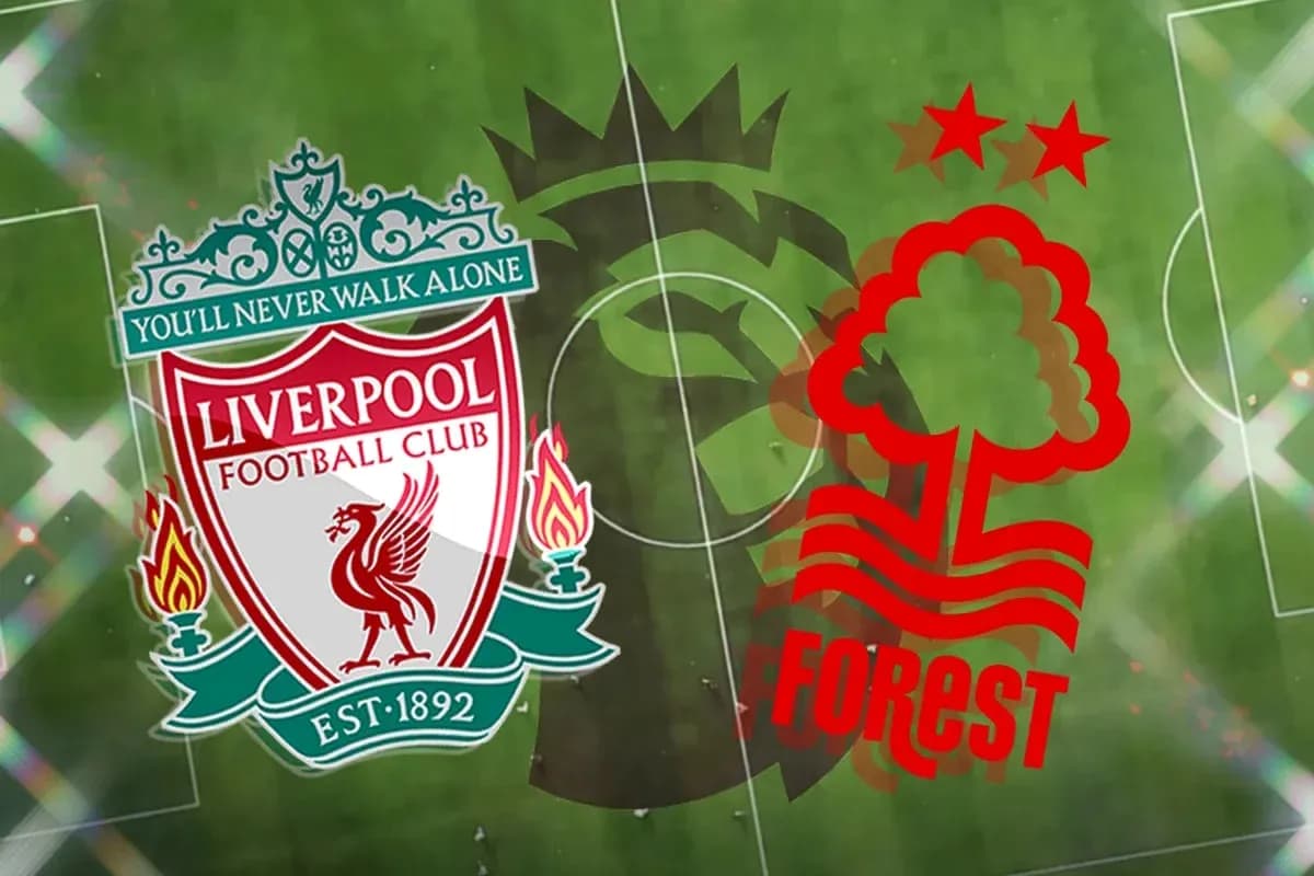 Liverpool and Nottingham Forest club logos on pitch