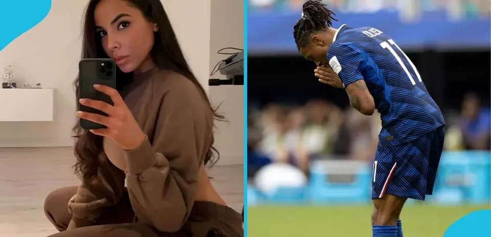 Person taking selfie next to football player kneeling