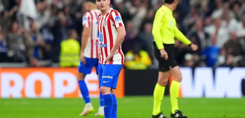 Atletico Madrid player looking dejected on field