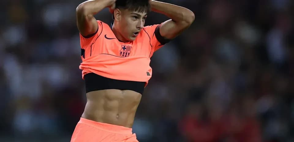 Player adjusting his jersey during a match