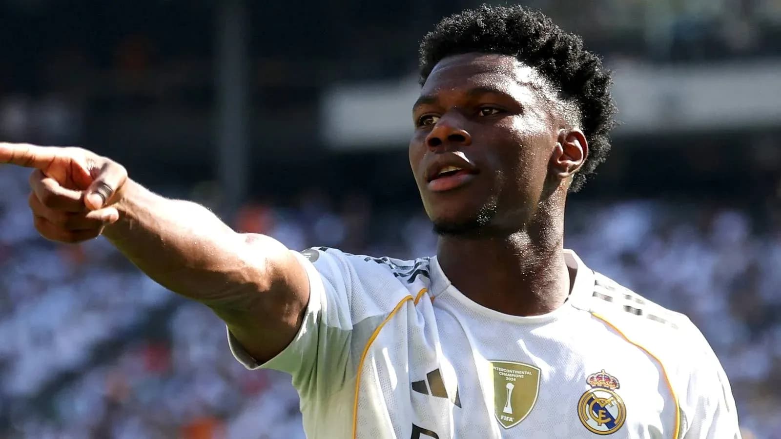 Player pointing during match for Real Madrid