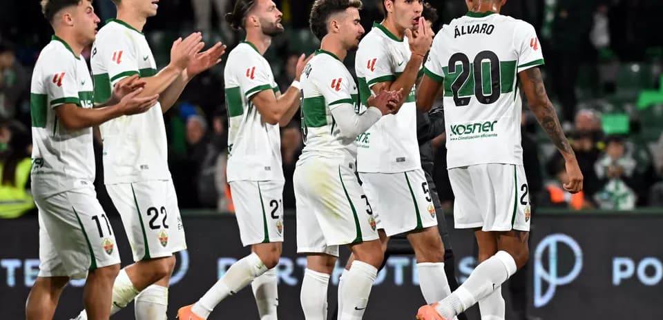 Elche players celebrating a goal during match