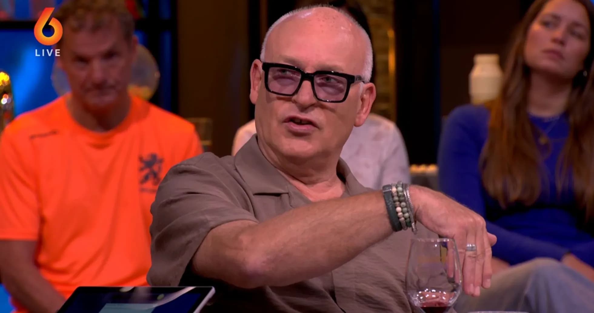 Man speaking during a talk show segment