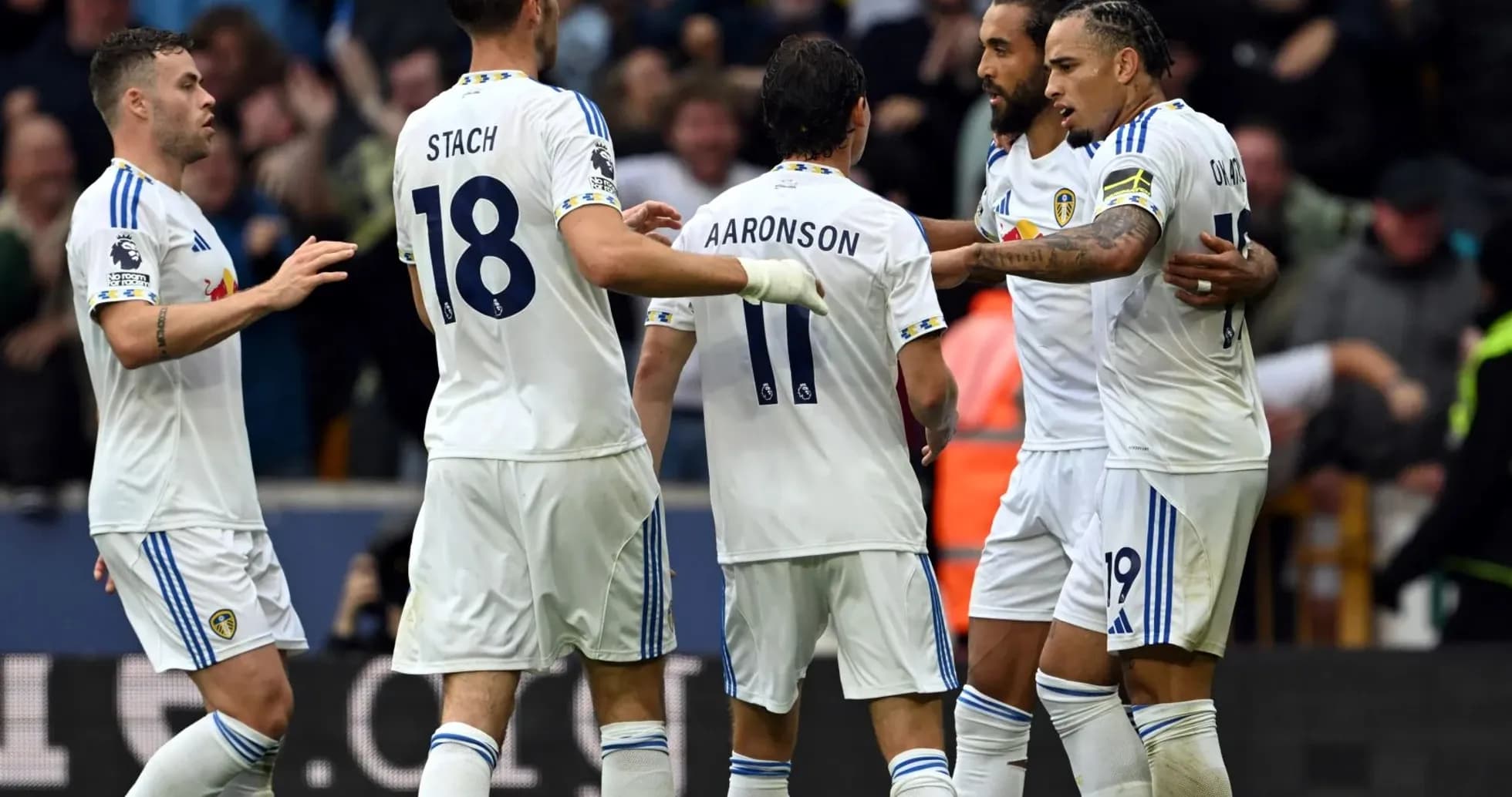 Leeds players celebrating a goal during match