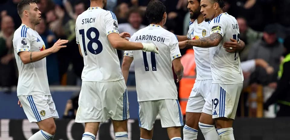 Leeds players celebrating a goal during match