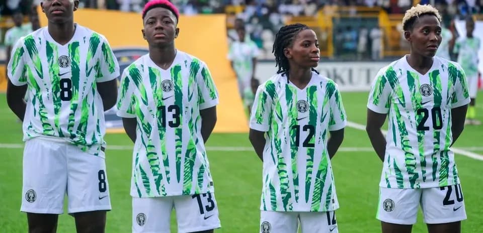 Four Nigerian players lined up before a match