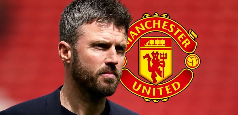 Man in front of Manchester United logo