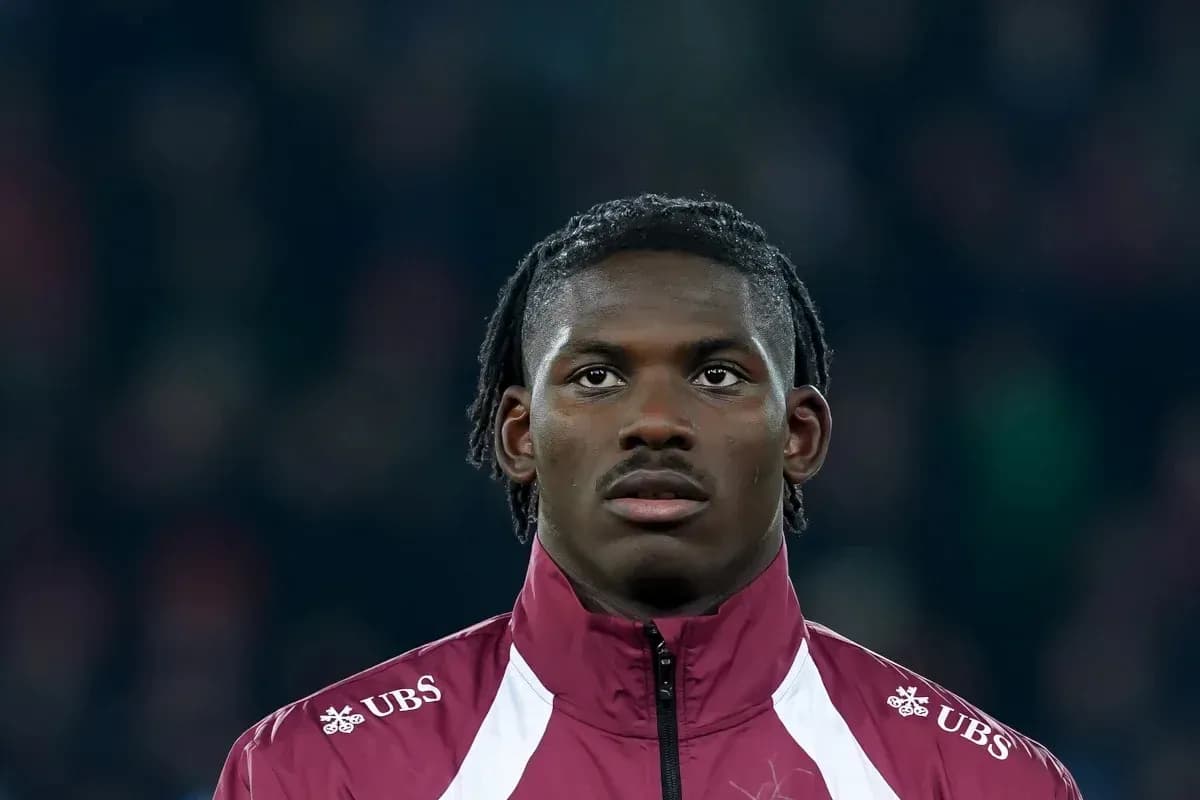 Player in team jacket during match preparation