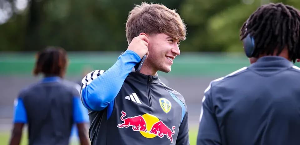 Player adjusting earphone during training session
