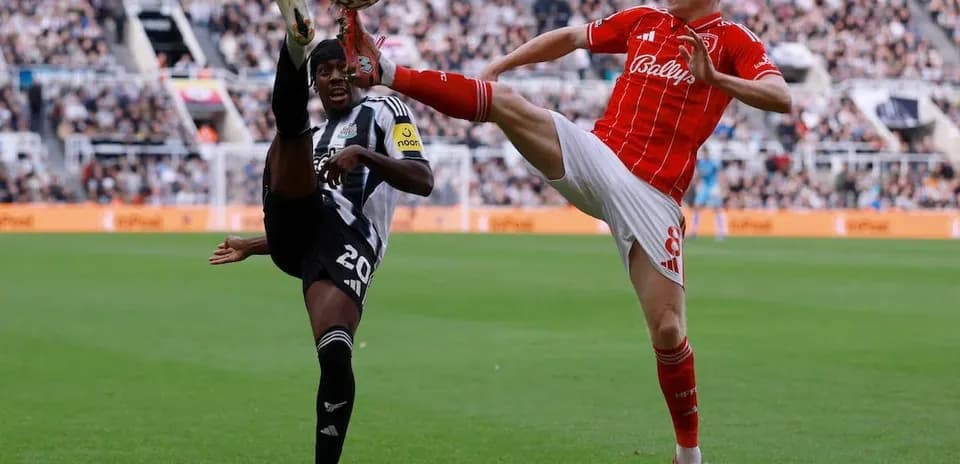 Players competing for the ball during match