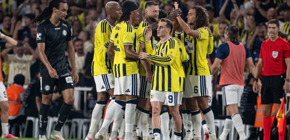 Fenerbahçe players celebrating a goal during match