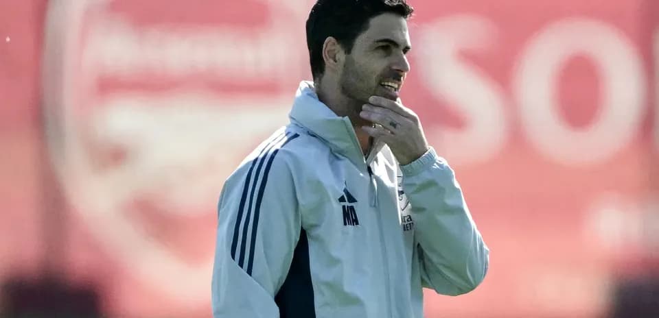 Manager observing during training session at Arsenal