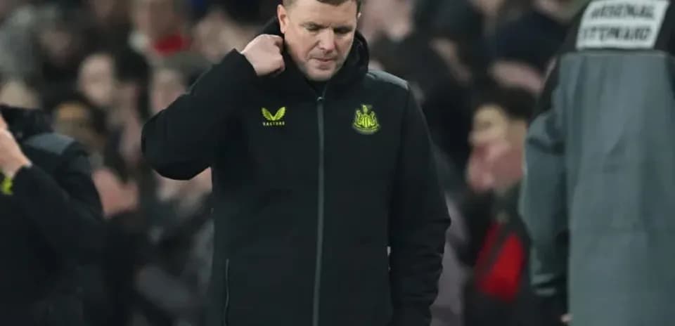 Newcastle United manager walking on the sideline