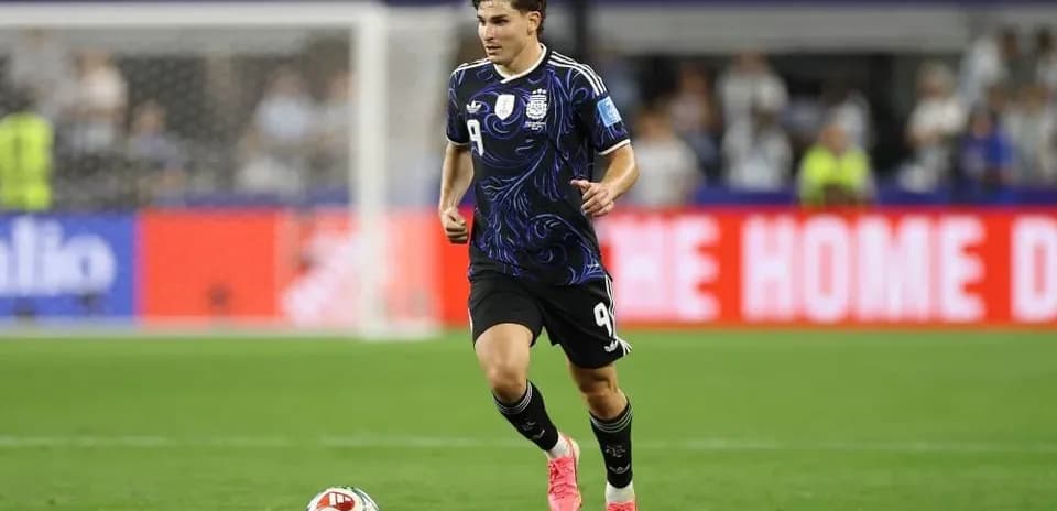 Player running with ball during match on field