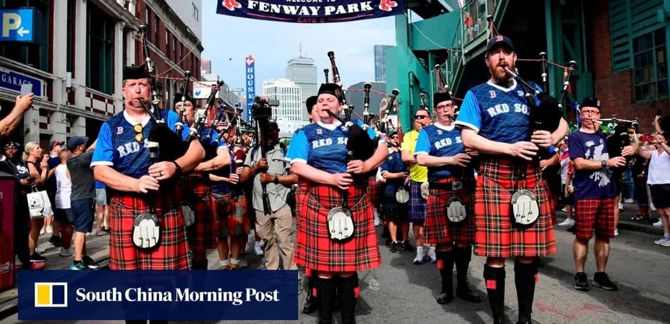 Bagpipers in kilts performing outside Fenway Park