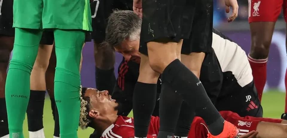 Player receiving medical attention on the field