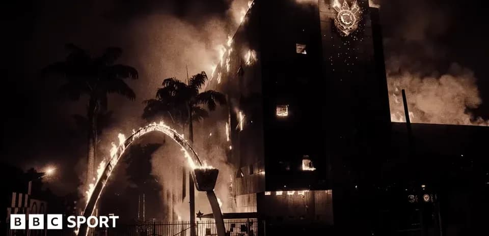 Building engulfed in flames at night