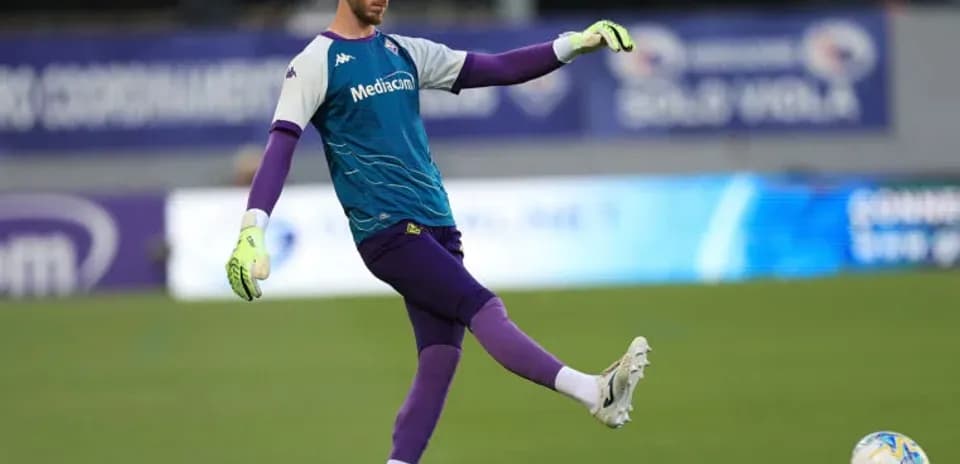Goalkeeper practicing a kick during training session