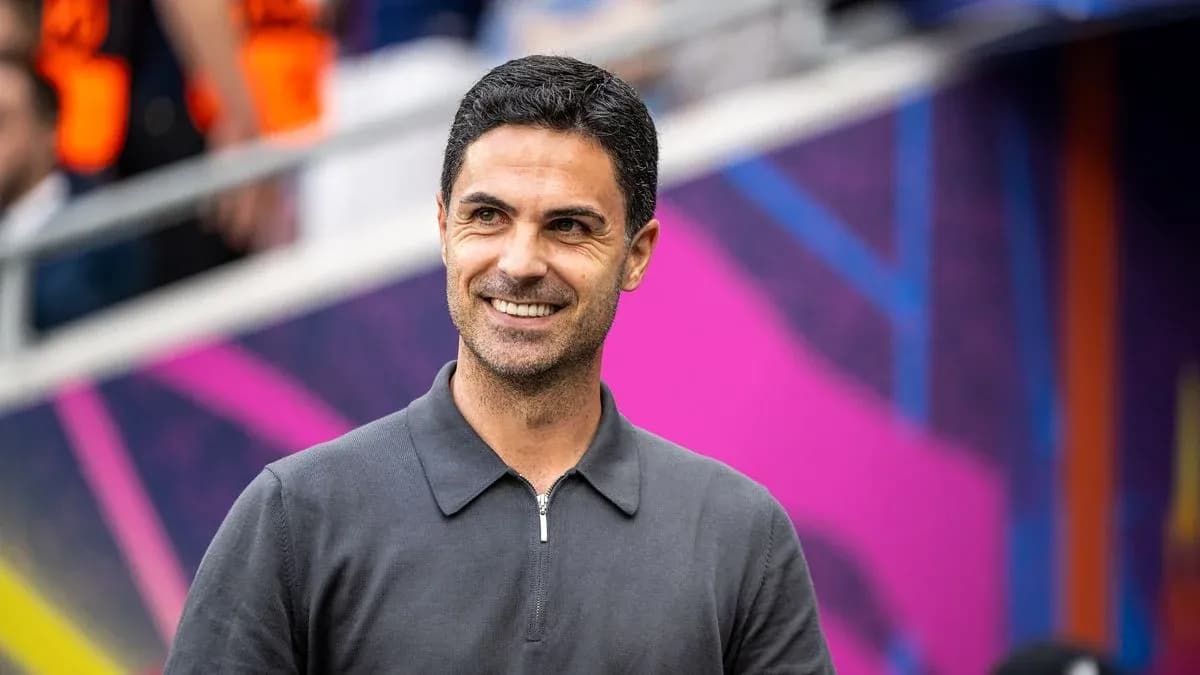Coach smiling during a match day event