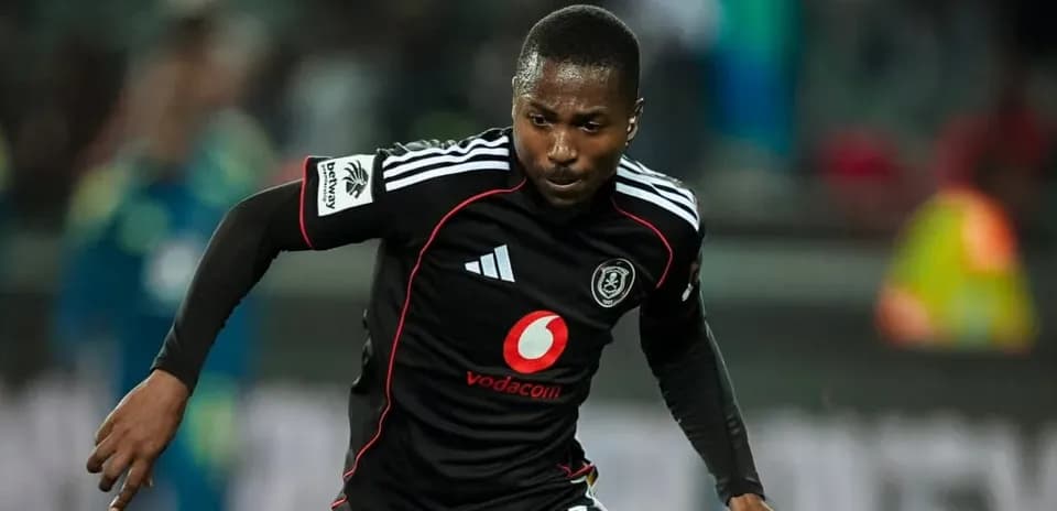 Player running during a match in black jersey