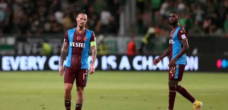 Trabzonspor players on the pitch after match