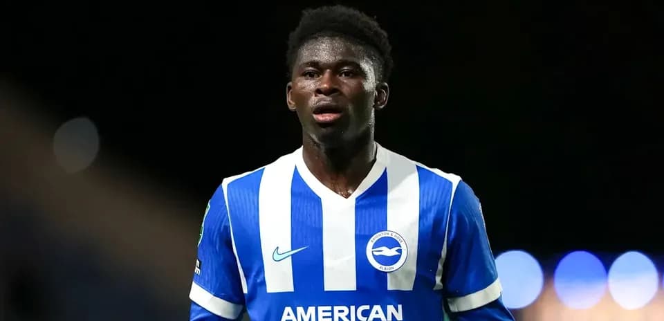 Player in blue and white kit during match