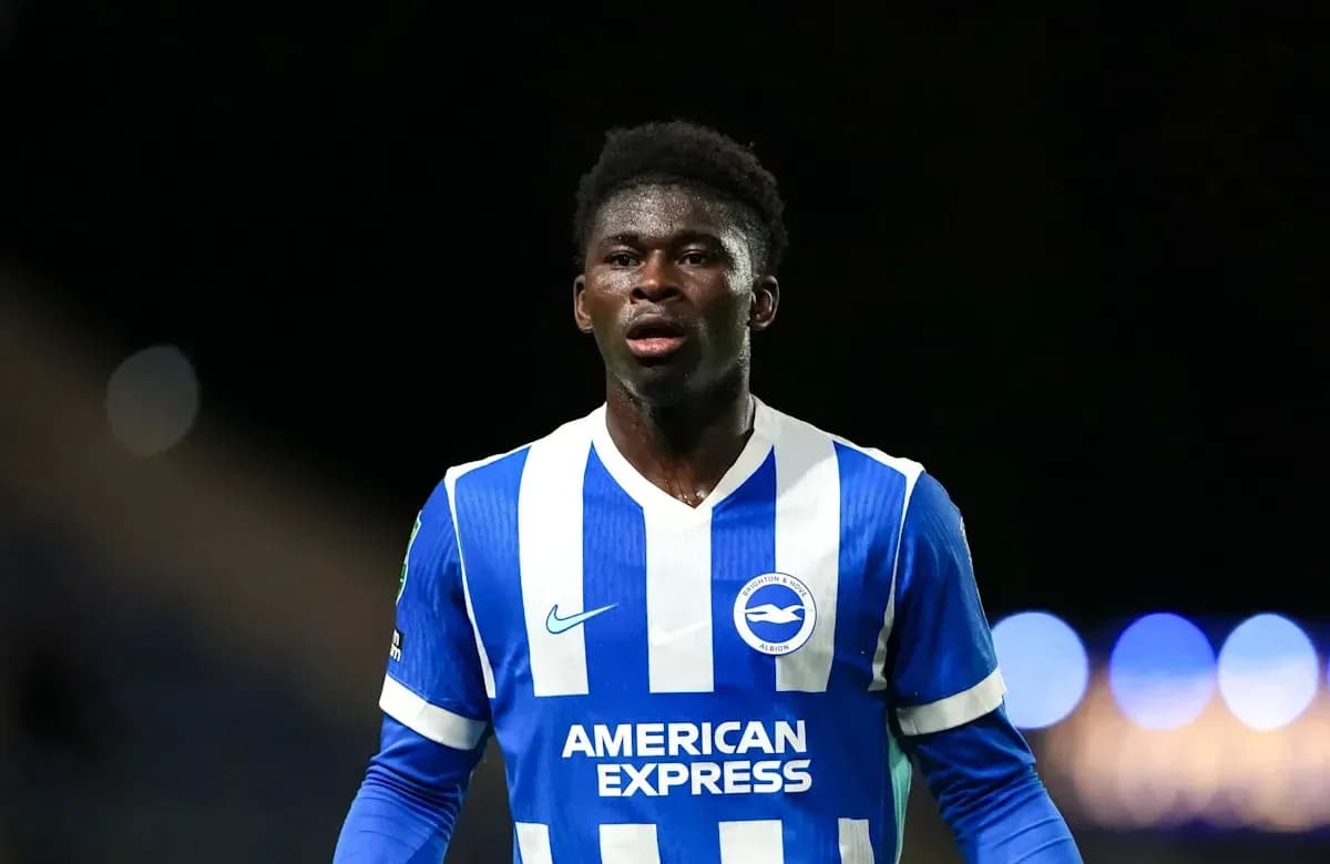 Player in blue and white kit during match