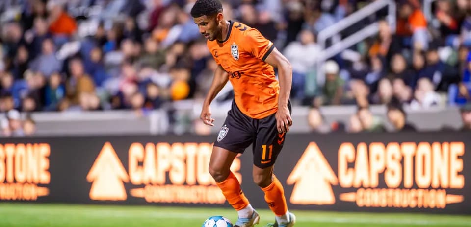 Player dribbling the ball during match