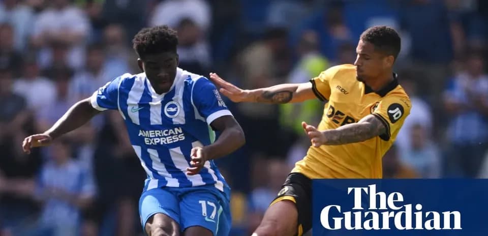 Player from Brighton dribbling past opponent during match